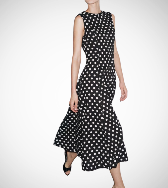 Black dress with white polka dots worn by a model on a white zara style long maxi sleeveless new year outfit holidays sexy women's clothing love bonito crew neck asian fit korean style clothing online shopping 
