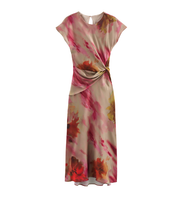 Floral dress with a knot detail on a white background zara tie die style short sleeves mutli-color wedding holidays special occassion dresses women's clothing love bonito uniqlo h&m shein what to wear outifit ootd fashion 