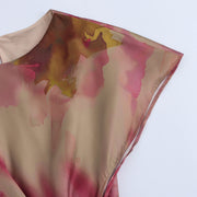 Floral dress with a knot detail on a white background zara tie die style short sleeves mutli-color wedding holidays special occassion dresses women's clothing love bonito uniqlo h&m shein what to wear outifit ootd fashion 