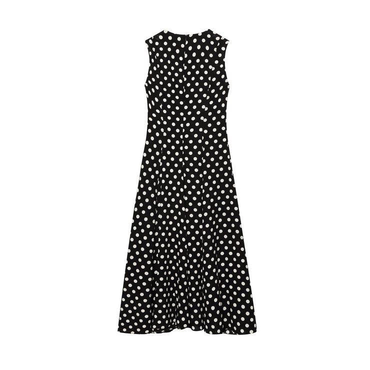 Black dress with white polka dots worn by a model on a white zara style long maxi sleeveless new year outfit holidays sexy women's clothing love bonito crew neck asian fit korean style clothing online shopping 