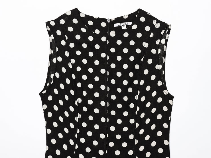 Black dress with white polka dots worn by a model on a white zara style long maxi sleeveless new year outfit holidays sexy women's clothing love bonito crew neck asian fit korean style clothing online shopping 