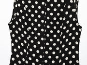 Black dress with white polka dots worn by a model on a white zara style long maxi sleeveless new year outfit holidays sexy women's clothing love bonito crew neck asian fit korean style clothing online shopping 