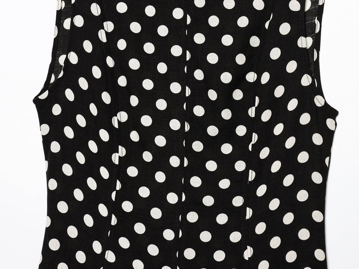 Black dress with white polka dots worn by a model on a white zara style long maxi sleeveless new year outfit holidays sexy women's clothing love bonito crew neck asian fit korean style clothing online shopping 