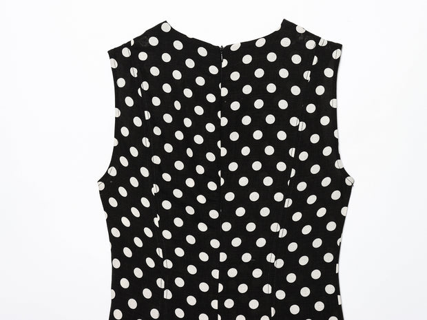 Black dress with white polka dots worn by a model on a white zara style long maxi sleeveless new year outfit holidays sexy women's clothing love bonito crew neck asian fit korean style clothing online shopping 