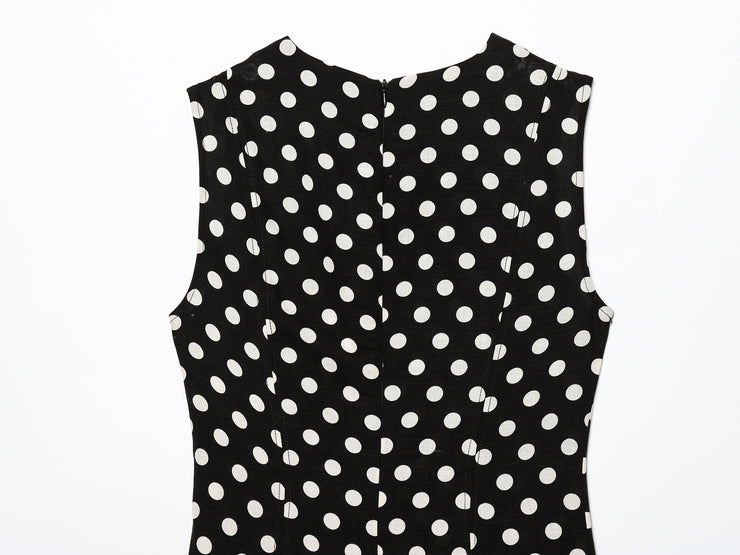 Black dress with white polka dots worn by a model on a white zara style long maxi sleeveless new year outfit holidays sexy women's clothing love bonito crew neck asian fit korean style clothing online shopping 