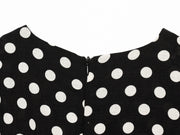 Black dress with white polka dots worn by a model on a white zara style long maxi sleeveless new year outfit holidays sexy women's clothing love bonito crew neck asian fit korean style clothing online shopping 