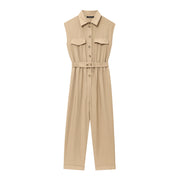 khaki women wearing a jumpsuit with side pockets uniqlo zara mango style online shopping sleeveless cargo utility wear cuff sleeves short belted waist gartered button down polo shirt everyday casual style classic wear ootd outfit must have trending 