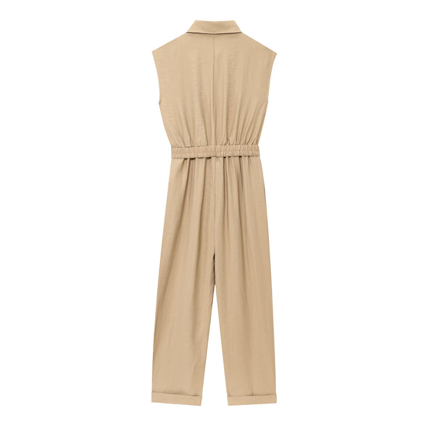 khaki women wearing a jumpsuit with side pockets uniqlo zara mango style online shopping sleeveless cargo utility wear cuff sleeves short belted waist gartered button down polo shirt everyday casual style classic wear ootd outfit must have trending 