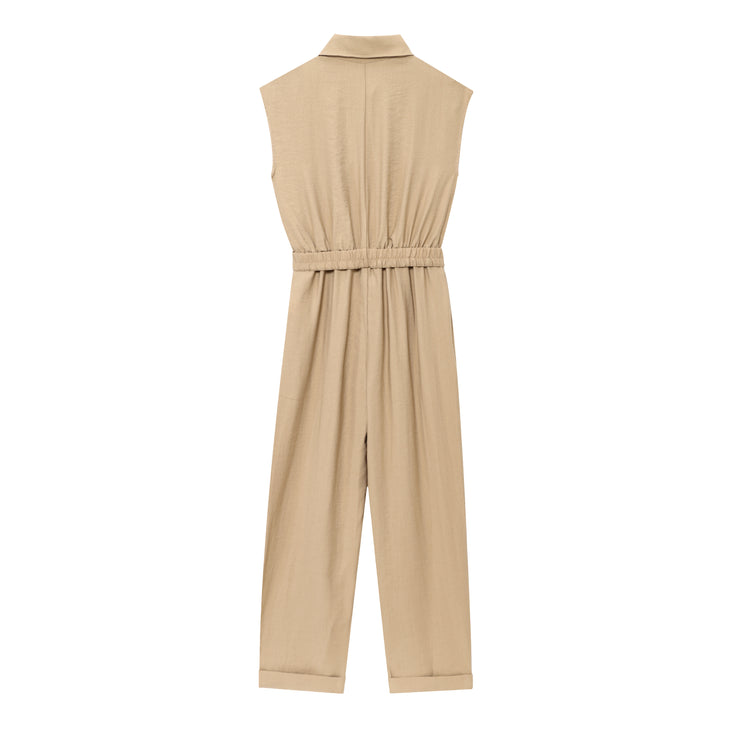 khaki women wearing a jumpsuit with side pockets uniqlo zara mango style online shopping sleeveless cargo utility wear cuff sleeves short belted waist gartered button down polo shirt everyday casual style classic wear ootd outfit must have trending 