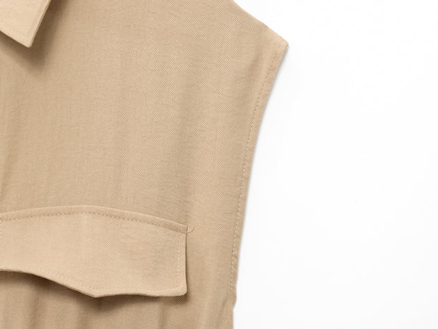 khaki women wearing a jumpsuit with side pockets uniqlo zara mango style online shopping sleeveless cargo utility wear cuff sleeves short belted waist gartered button down polo shirt everyday casual style classic wear ootd outfit must have trending 