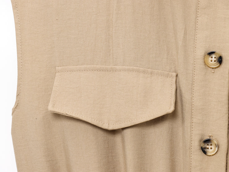 khaki women wearing a jumpsuit with side pockets uniqlo zara mango style online shopping sleeveless cargo utility wear cuff sleeves short belted waist gartered button down polo shirt everyday casual style classic wear ootd outfit must have trending 