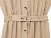 khaki women wearing a jumpsuit with side pockets uniqlo zara mango style online shopping sleeveless cargo utility wear cuff sleeves short belted waist gartered button down polo shirt everyday casual style classic wear ootd outfit must have trending 