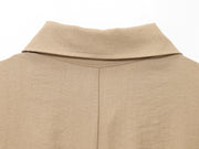 khaki women wearing a jumpsuit with side pockets uniqlo zara mango style online shopping sleeveless cargo utility wear cuff sleeves short belted waist gartered button down polo shirt everyday casual style classic wear ootd outfit must have trending 