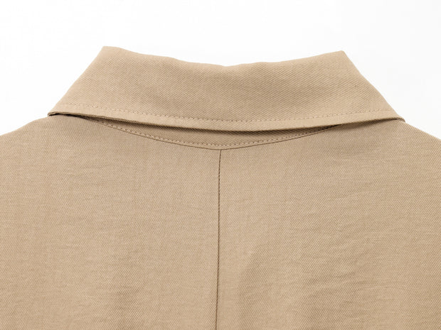 khaki women wearing a jumpsuit with side pockets uniqlo zara mango style online shopping sleeveless cargo utility wear cuff sleeves short belted waist gartered button down polo shirt everyday casual style classic wear ootd outfit must have trending 