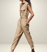 khaki women wearing a jumpsuit with side pockets uniqlo zara mango style online shopping sleeveless cargo utility wear cuff sleeves short belted waist gartered button down polo shirt everyday casual style classic wear ootd outfit must have trending 
